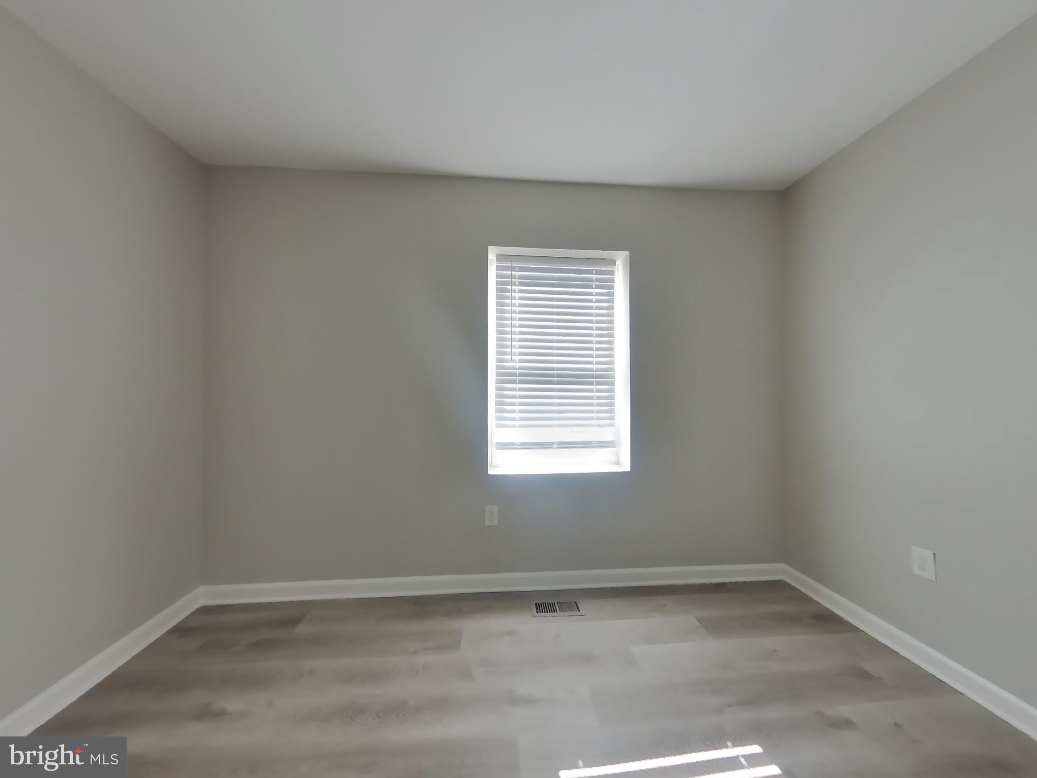 4217 Vine Street Capitol Heights, MD 20743 - Photo 6 of 15 an empty room with a window