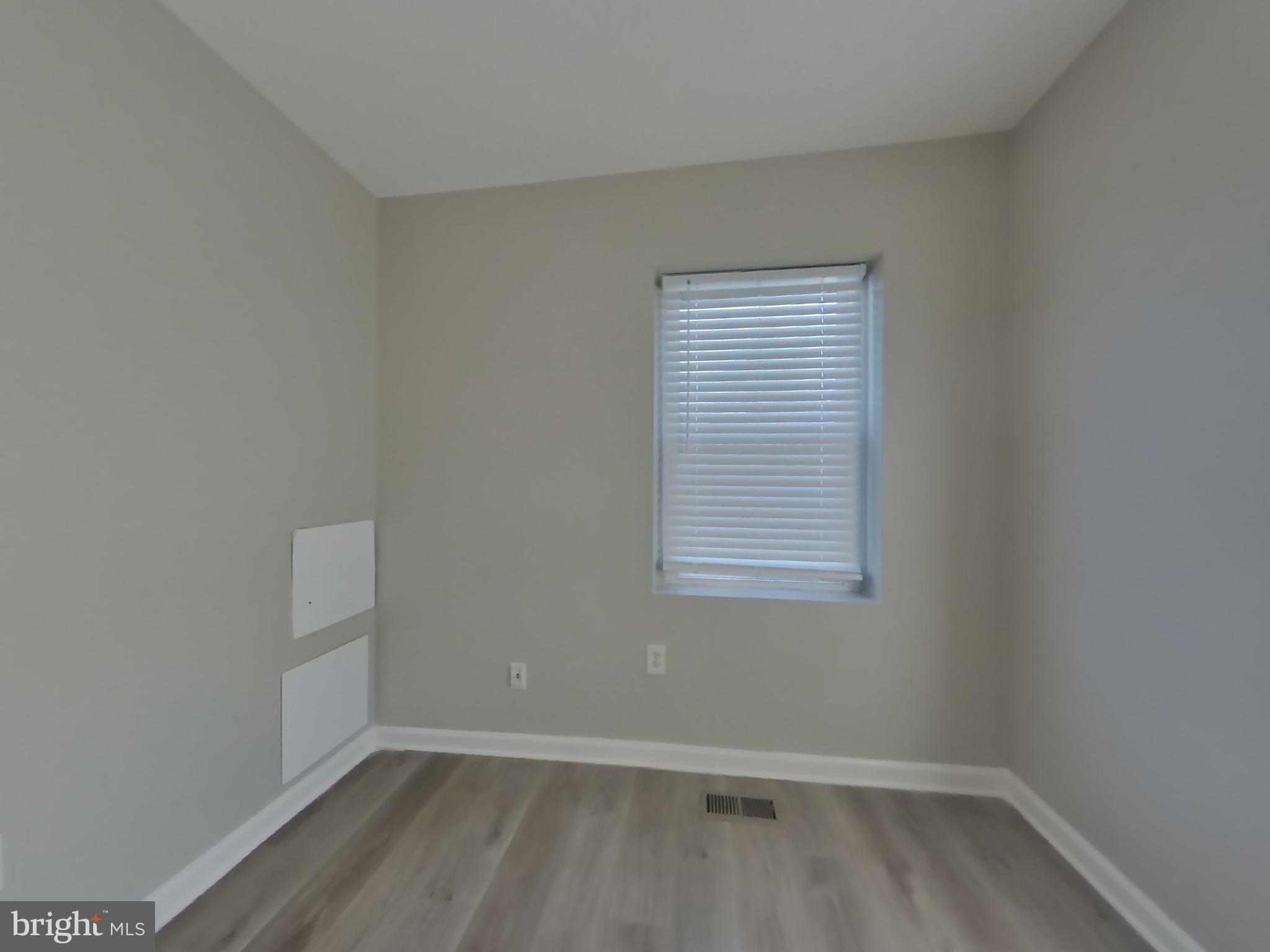 4217 Vine Street Capitol Heights, MD 20743 - Photo 7 of 15 an empty room with a window