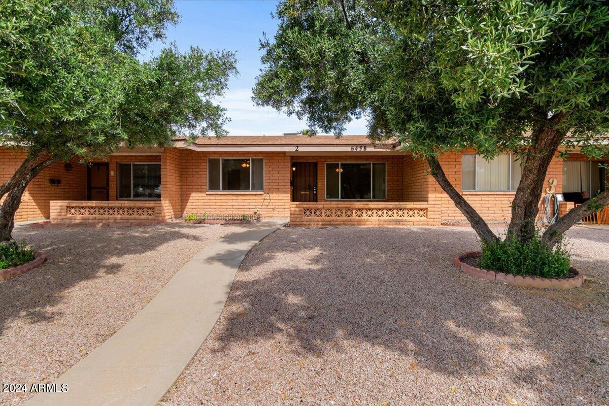 6438 East Butte Street, Unit 2 Mesa, AZ 85205 - Photo 2 of 27 a view of a house with a patio