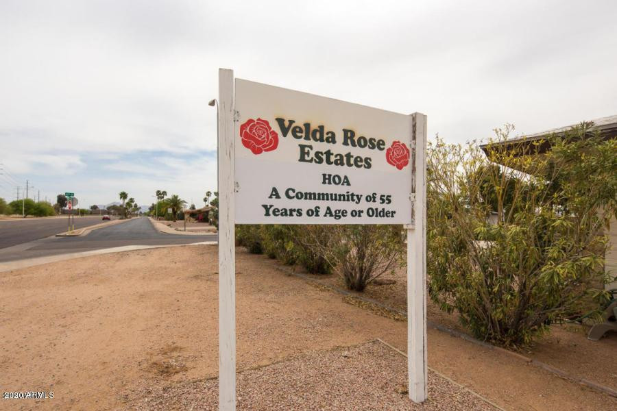 6438 East Butte Street, Unit 2 Mesa, AZ 85205 - Photo 27 of 27 a sign on the side of a road