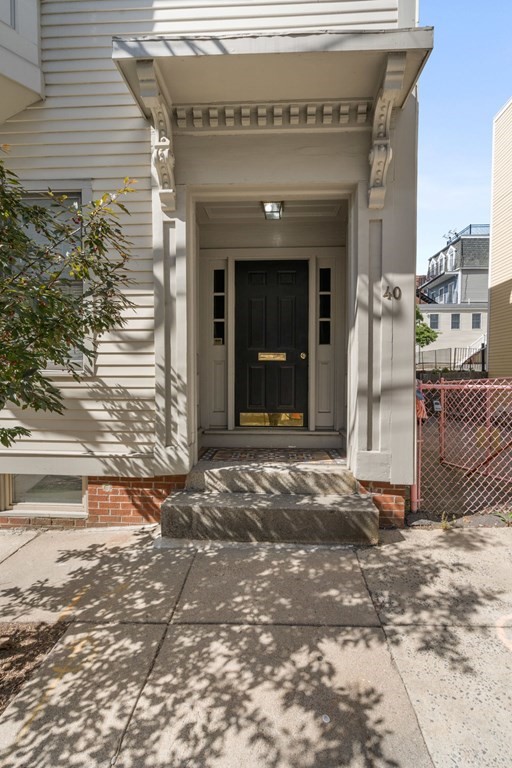 40 Pearl Street, Unit 2 Boston, MA 02129 - Photo 13 of 13 a front view of a house with a yard