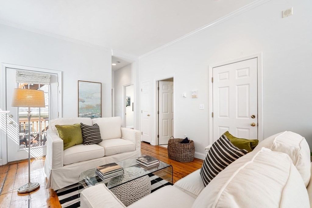 40 Pearl Street, Unit 2 Boston, MA 02129 - Photo 6 of 13 a living room with furniture and a large window