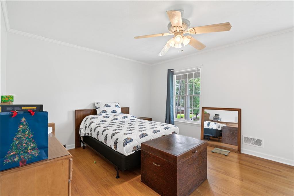 3061 General Lee Road Macon, GA 31204 - Photo 14 of 27 a bedroom with a bed and a window