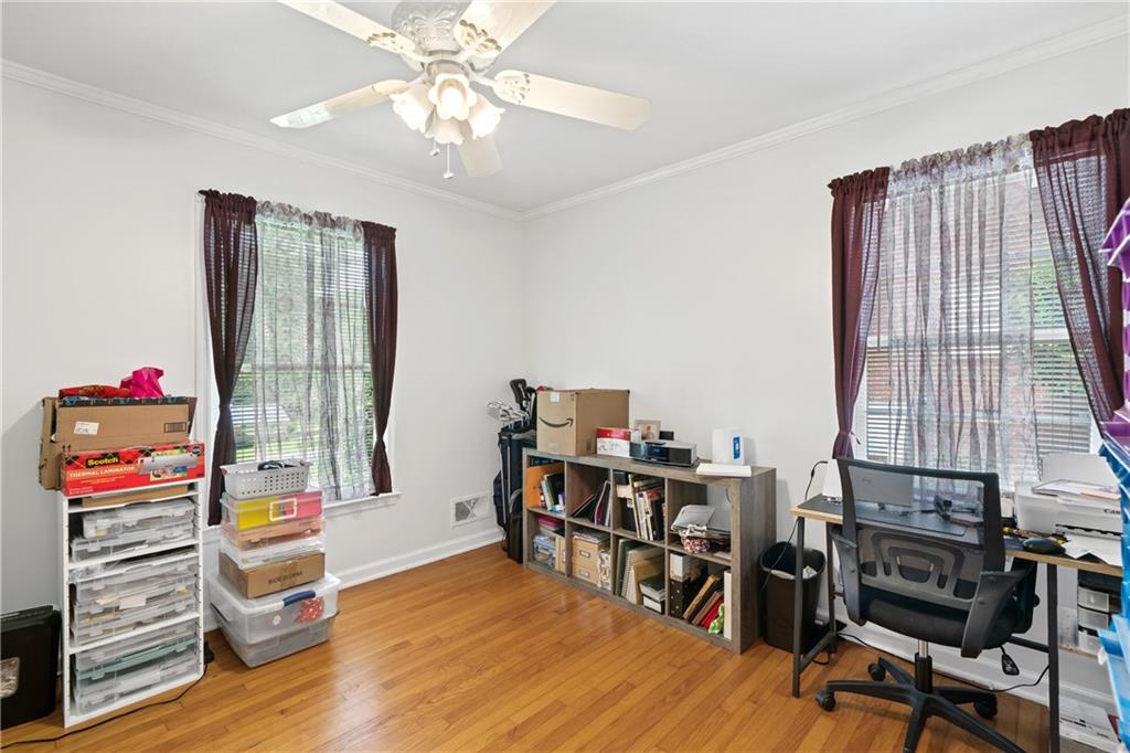 3061 General Lee Road Macon, GA 31204 - Photo 19 of 27 a living room with furniture and a wooden floor