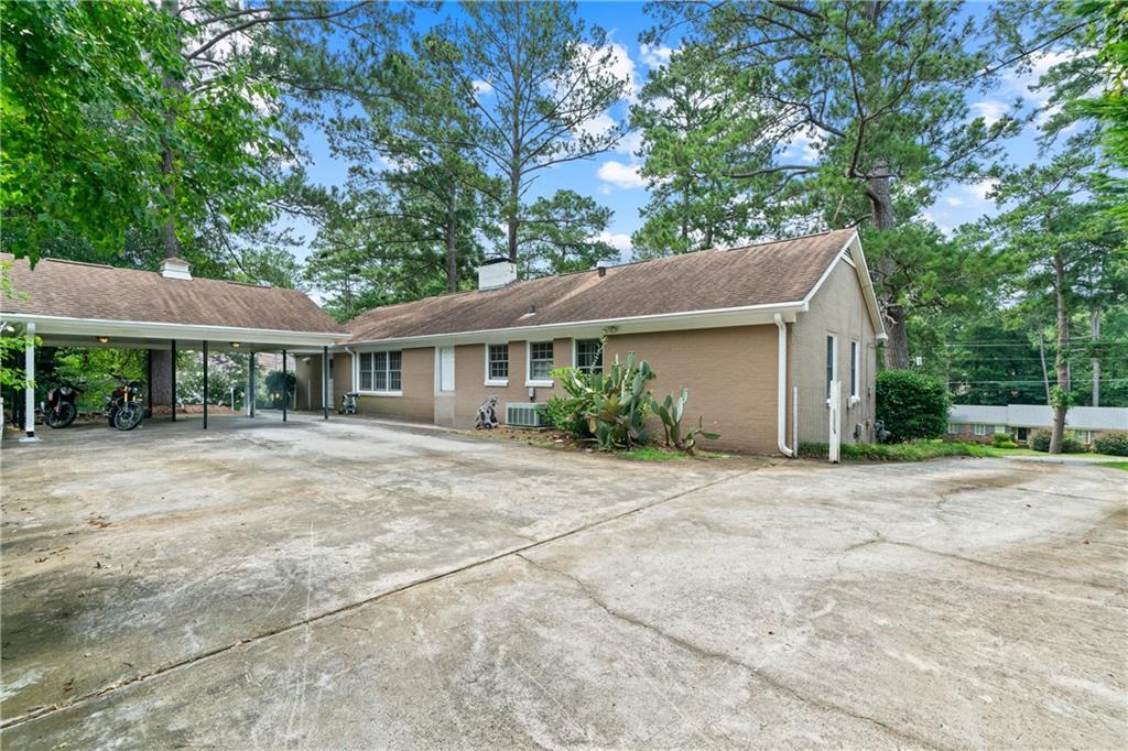 3061 General Lee Road Macon, GA 31204 - Photo 23 of 27 a front view of house with yard and trees around