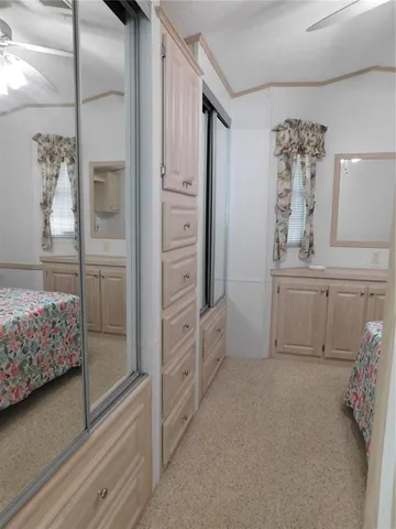 a bathroom with a double vanity sink and shower