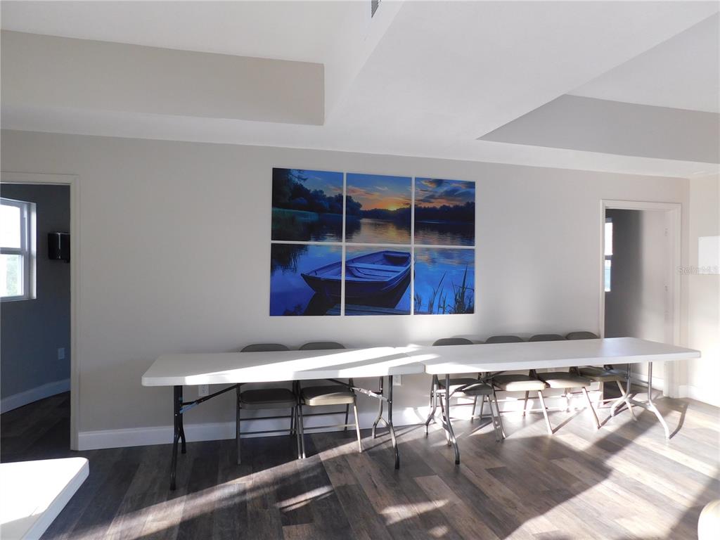 1385 Pine Island Drive St. Cloud, FL 34771 - Photo 23 of 28 a living room with a couch and a window