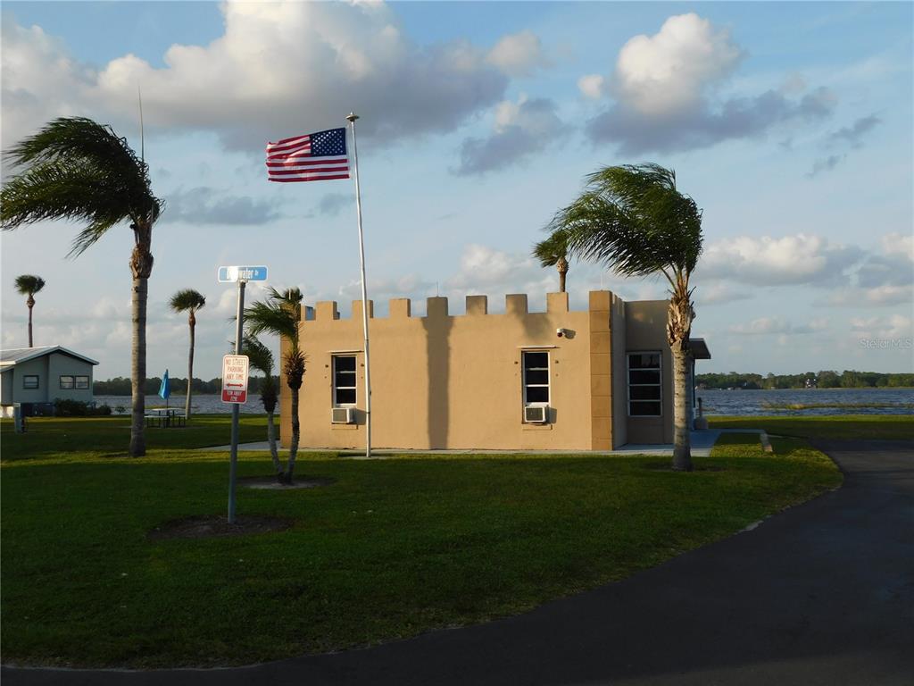 1385 Pine Island Drive St. Cloud, FL 34771 - Photo 27 of 28 a view of a park with welcome board