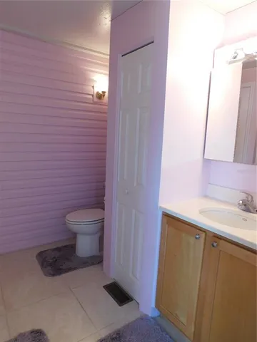 a bathroom with a sink and a toilet
