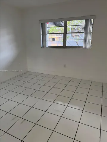 a view of a room and window