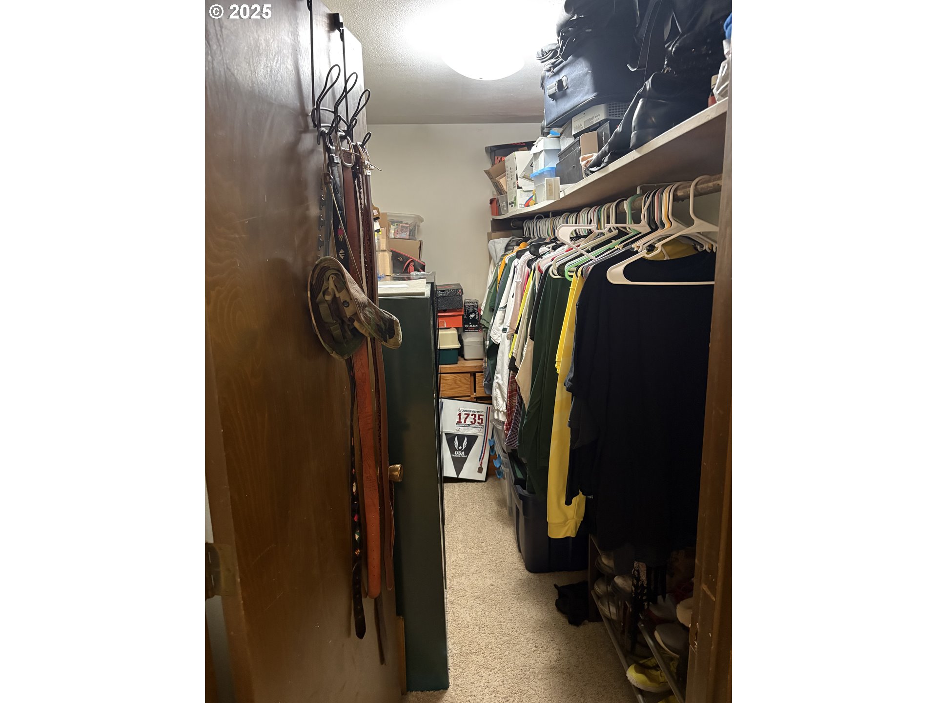 3460 Oxbow Way Eugene, OR 97401 - Photo 13 of 17 a view of walk in closet with clothes and shoes