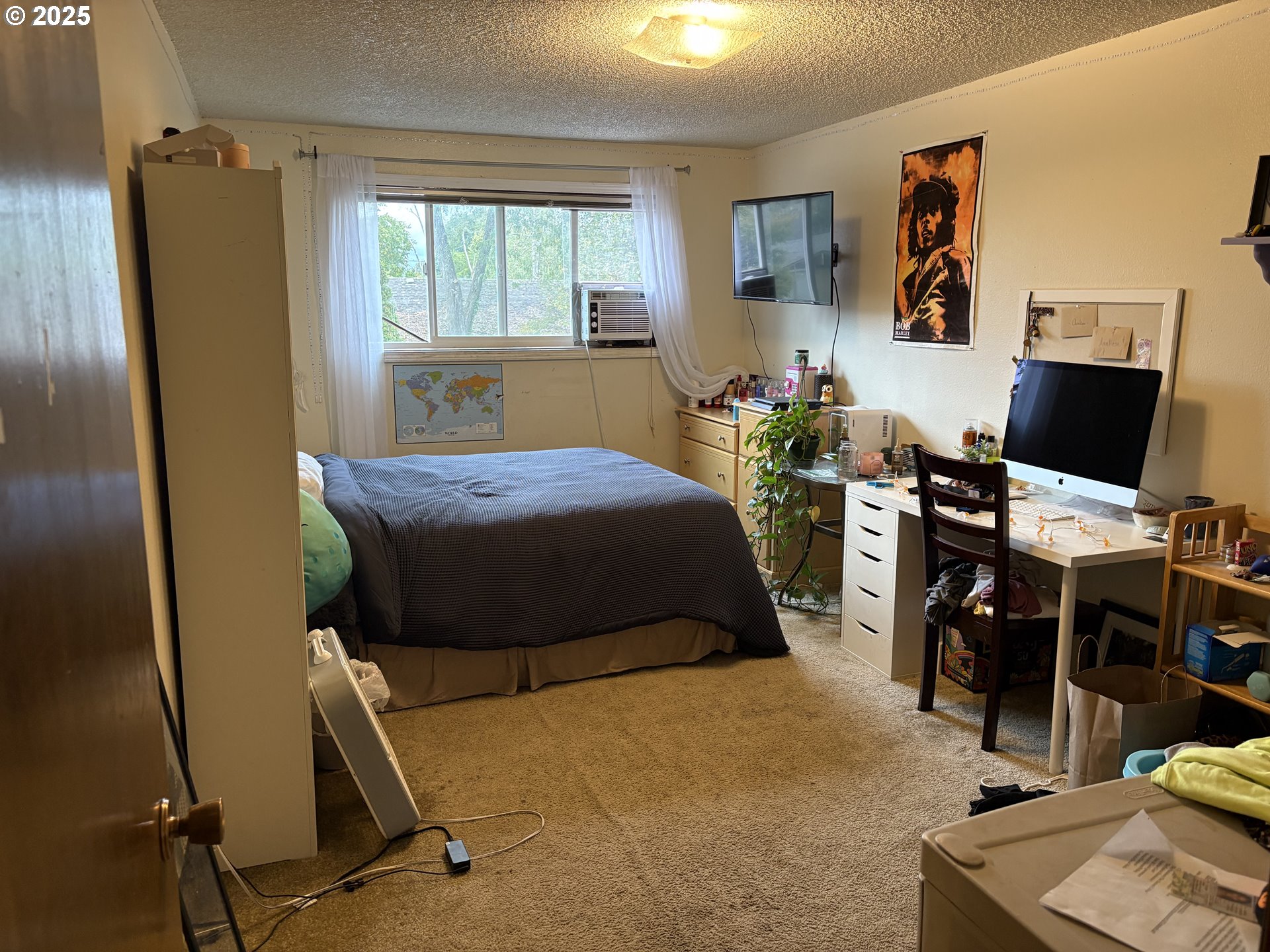 3460 Oxbow Way Eugene, OR 97401 - Photo 5 of 17 a bedroom with furniture and a window