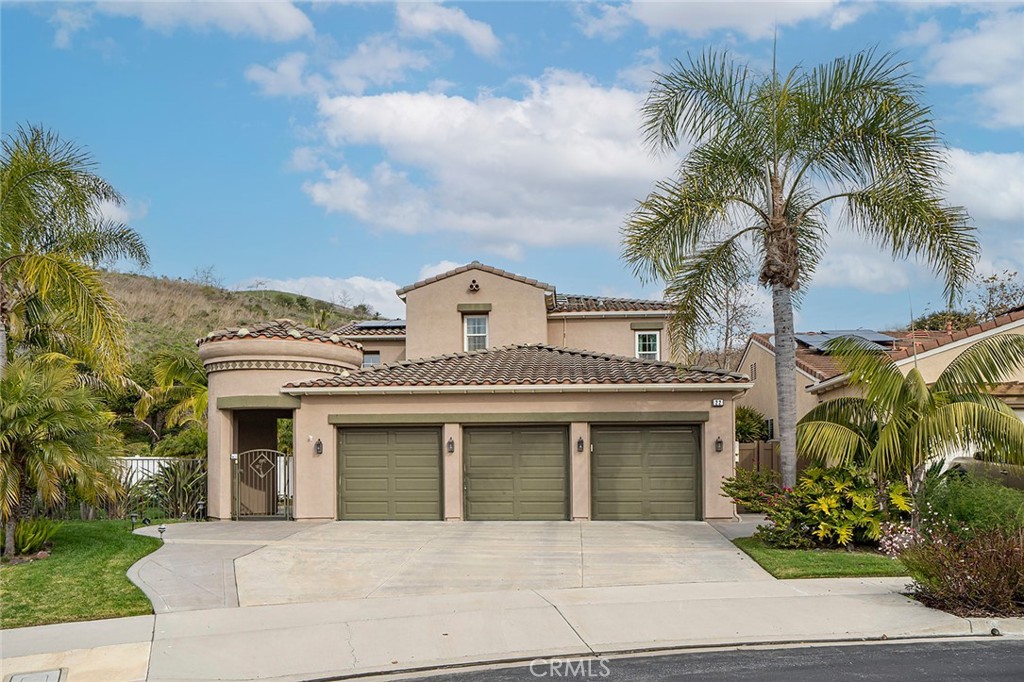 22 Via Sonrisa San Clemente, CA 92673 - Photo 1 of 59 a view of a white house with a large window and potted plants