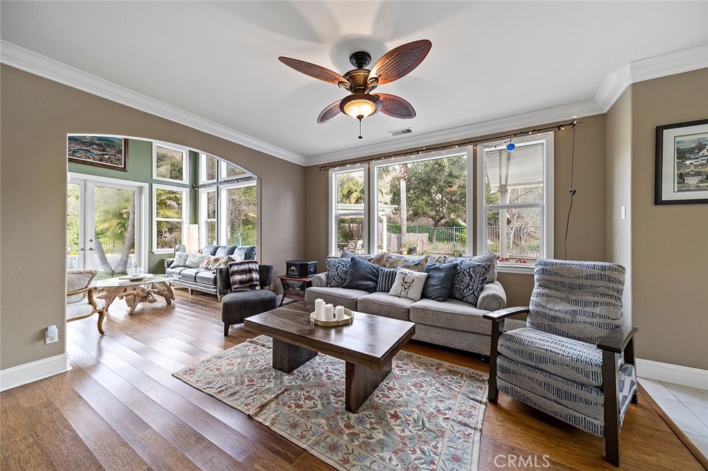 22 Via Sonrisa San Clemente, CA 92673 - Photo 11 of 59 a living room with furniture large windows and wooden floor