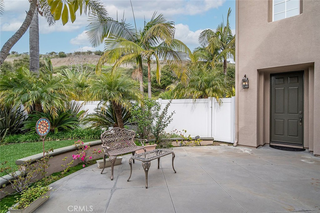 22 Via Sonrisa San Clemente, CA 92673 - Photo 2 of 59 a backyard of a house with lawn chairs plants and swimming pool