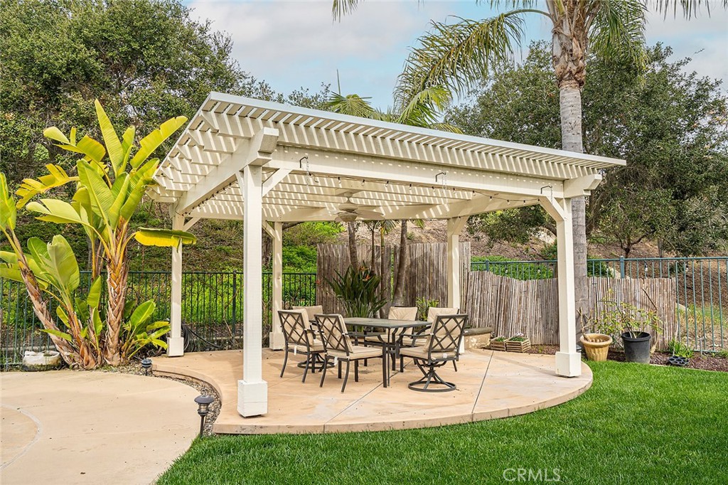 22 Via Sonrisa San Clemente, CA 92673 - Photo 50 of 59 a view of a patio with a table chairs and a patio