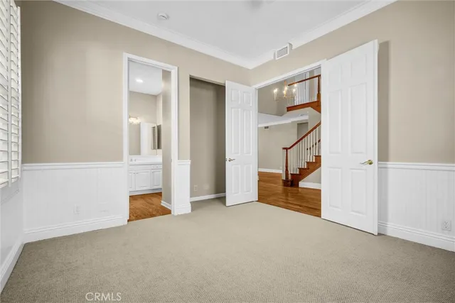 a spacious bathroom with a tub shower and a sink