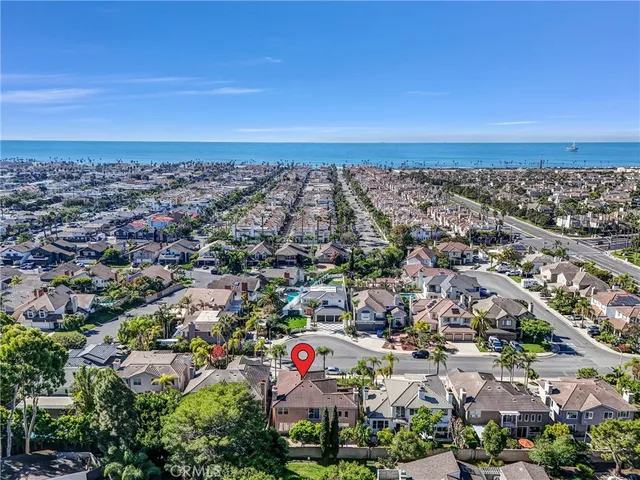 an aerial view of residential building and trees