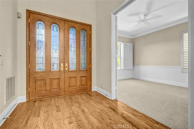 a large kitchen with granite countertop kitchen island a sink stove and cabinets