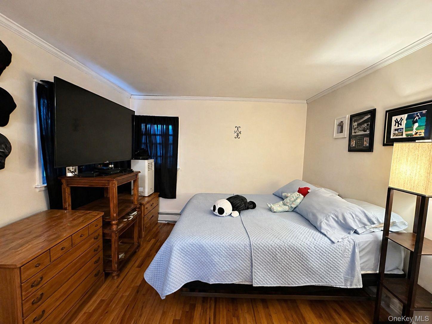76 Jay Road Centereach, NY 11720 - Photo 12 of 37 First-floor primary bedroom