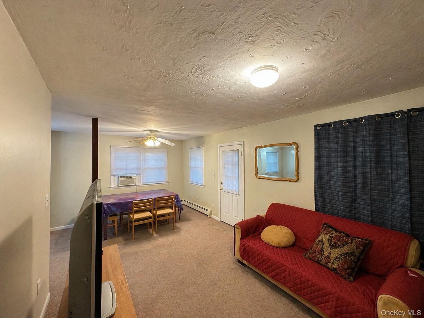 76 Jay Road Centereach, NY 11720 - Photo 27 of 37 Second-Floor Living and Dinning Area