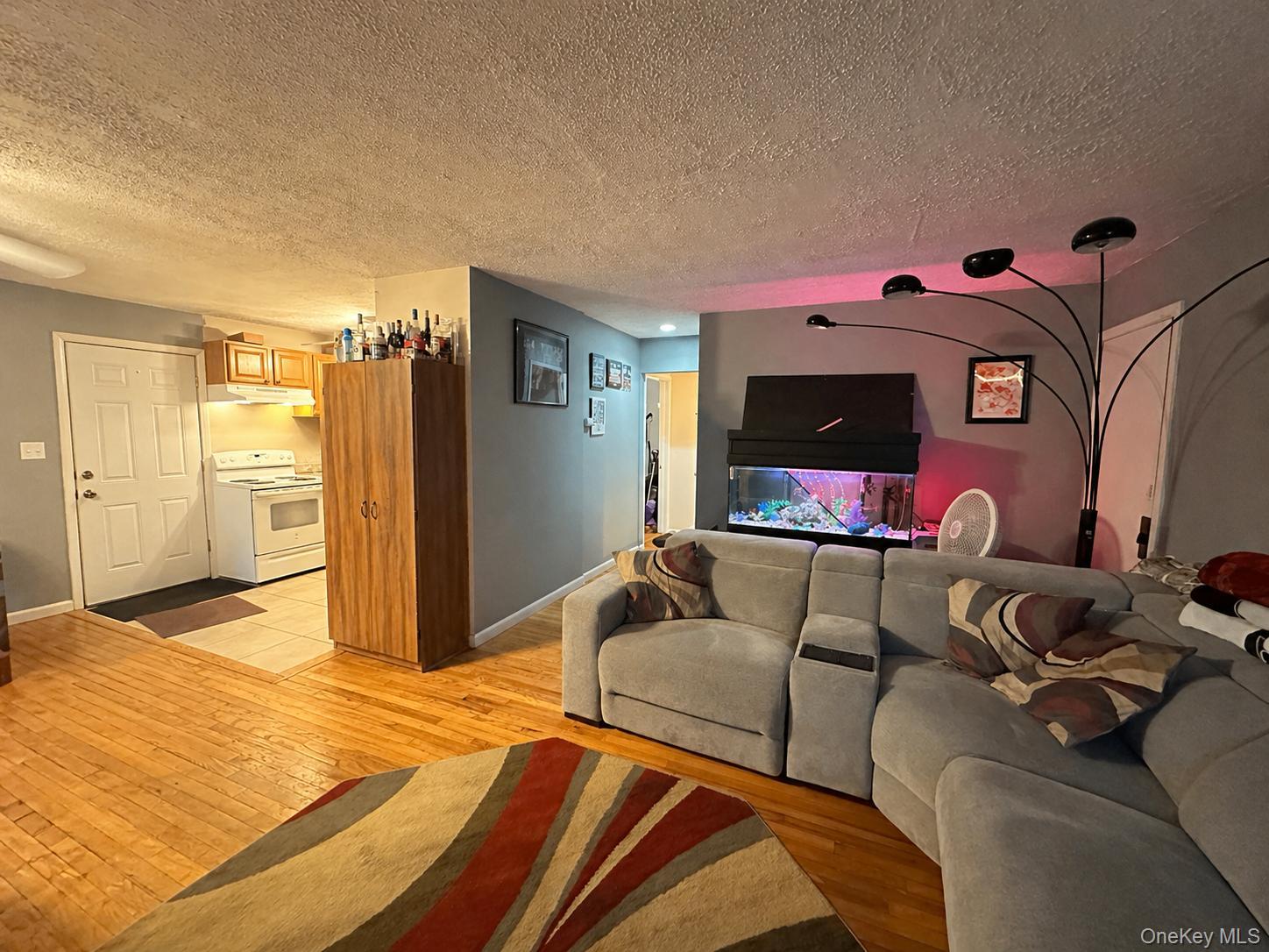 76 Jay Road Centereach, NY 11720 - Photo 6 of 37 First Floor.Hardwood flooring spans the main living area