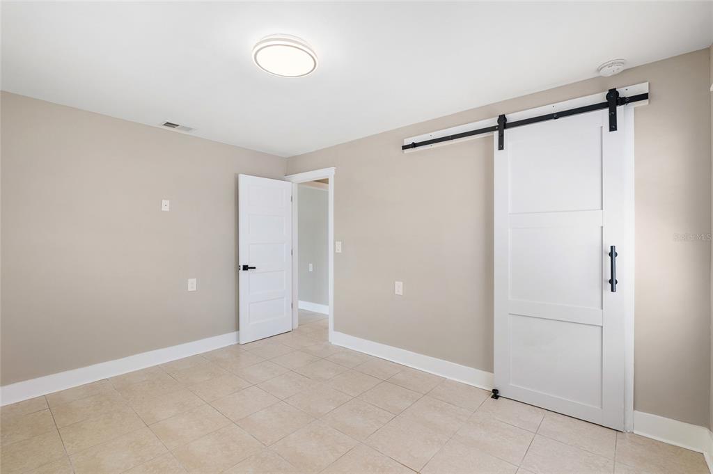 231 East Madeira Avenue Madeira Beach, FL 33708 - Photo 16 of 60 a view of an empty room