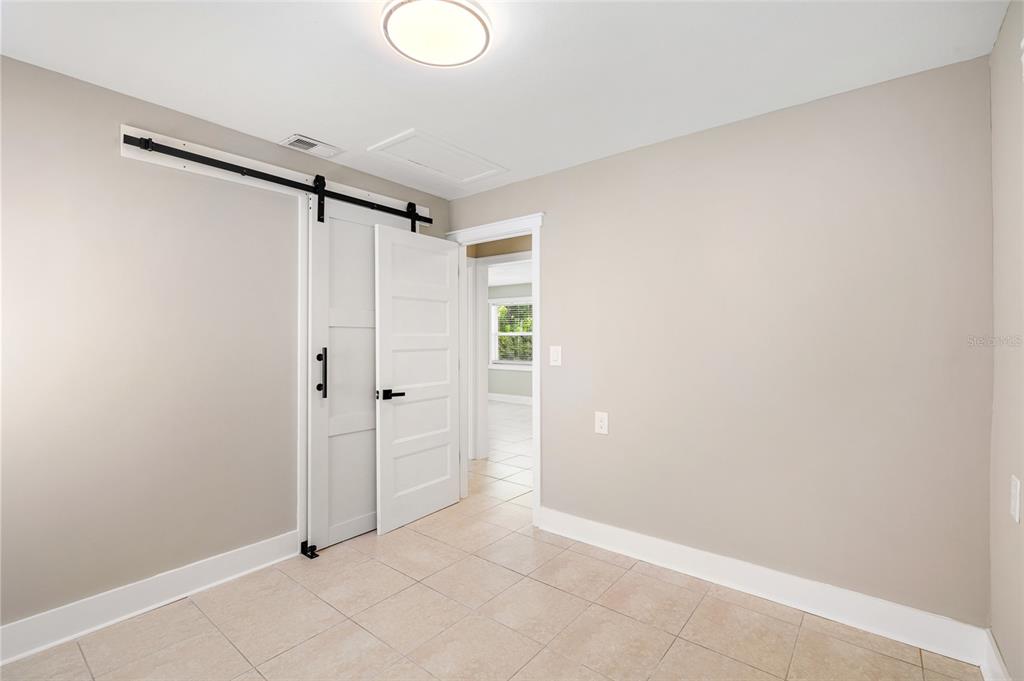 231 East Madeira Avenue Madeira Beach, FL 33708 - Photo 18 of 60 a view of an empty room