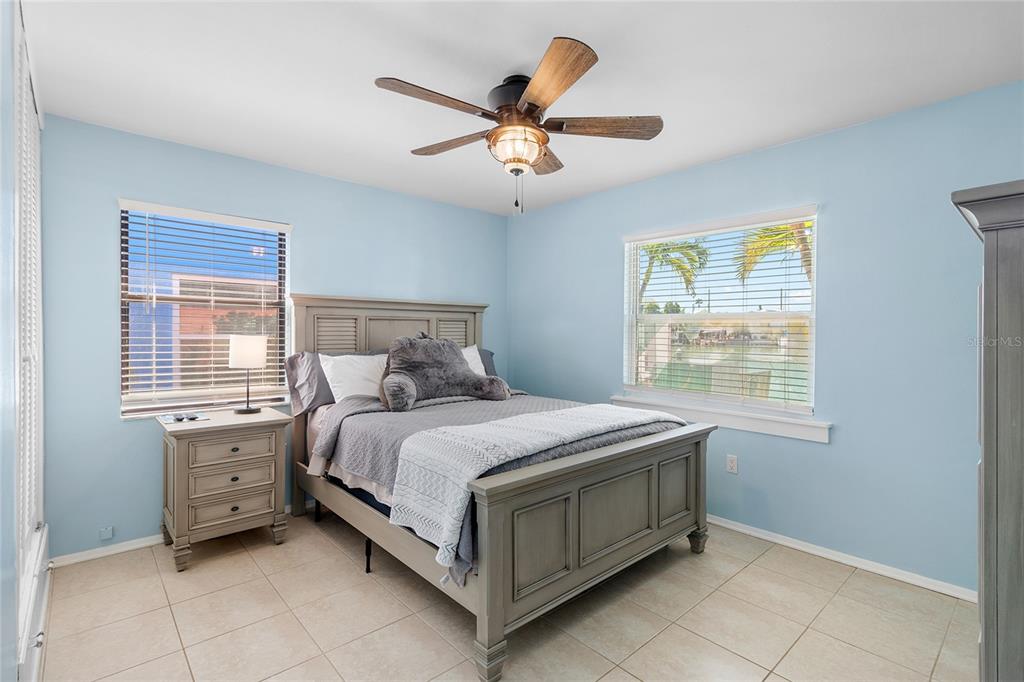 231 East Madeira Avenue Madeira Beach, FL 33708 - Photo 59 of 60 a bed room with a bed and a window