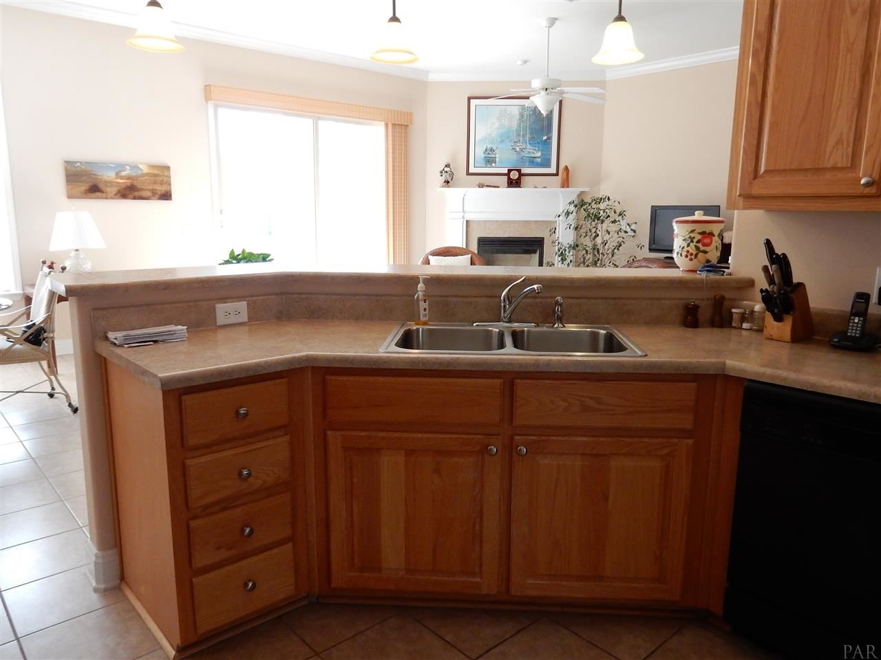 32615 Arbor Ridge Circle Lillian, AL 36549 - Photo 12 of 27 a kitchen with a sink and cabinets