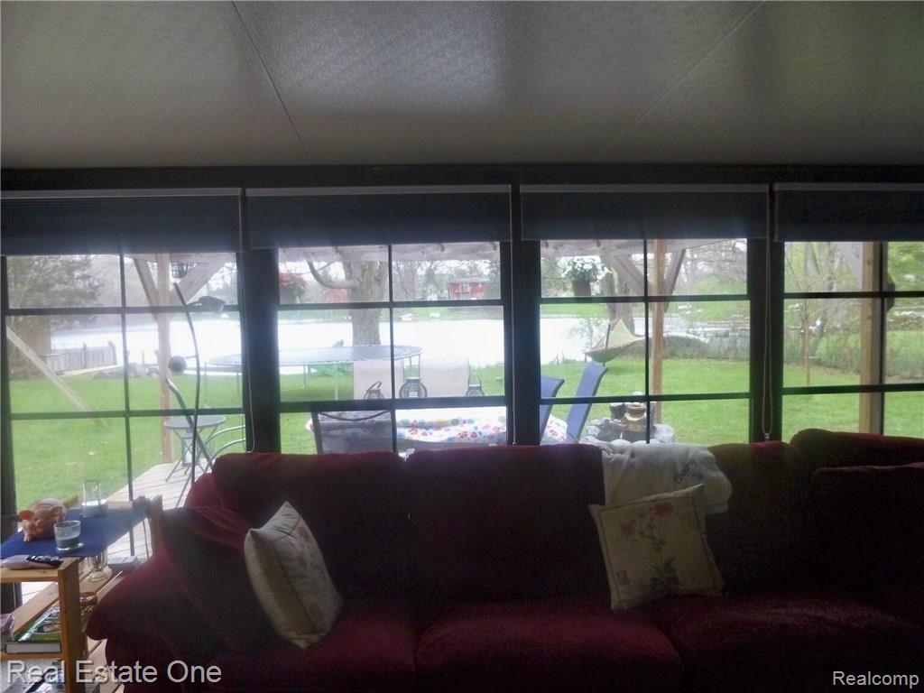 4345 Old Mill Road Pinckney, MI 48169 - Photo 20 of 39 Lake view from 3 season family room