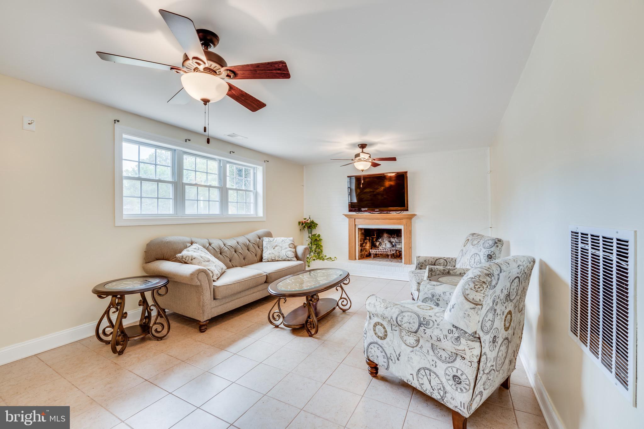 1201 Collingwood Road Alexandria, VA 22308 - Photo 26 of 35 Family room with fireplace