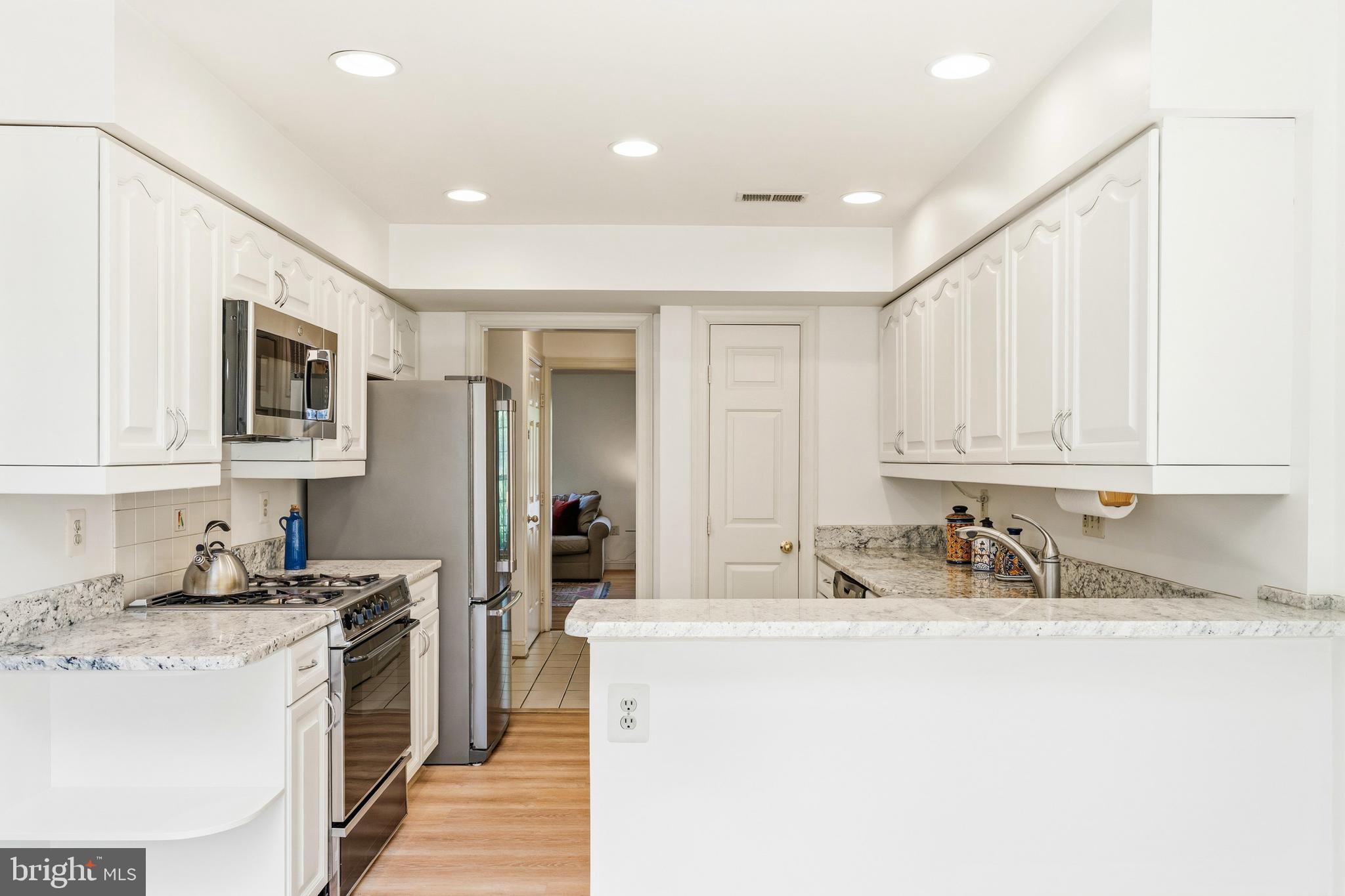 6518 Milva Lane Springfield, VA 22150 - Photo 17 of 55 Enjoy white cabinetry and recessed lighting