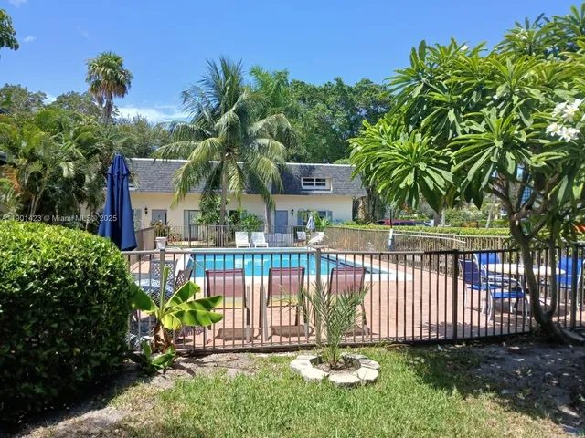 a garden view with a seating space