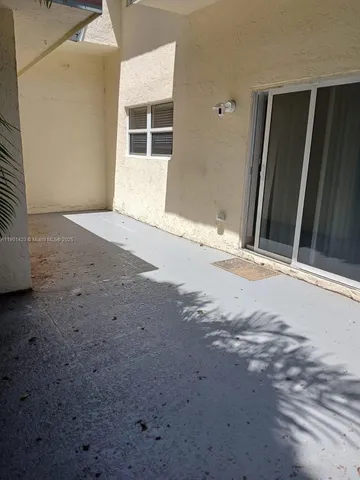 a view of a backyard of a house