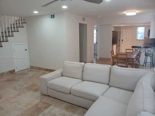 a living room with furniture