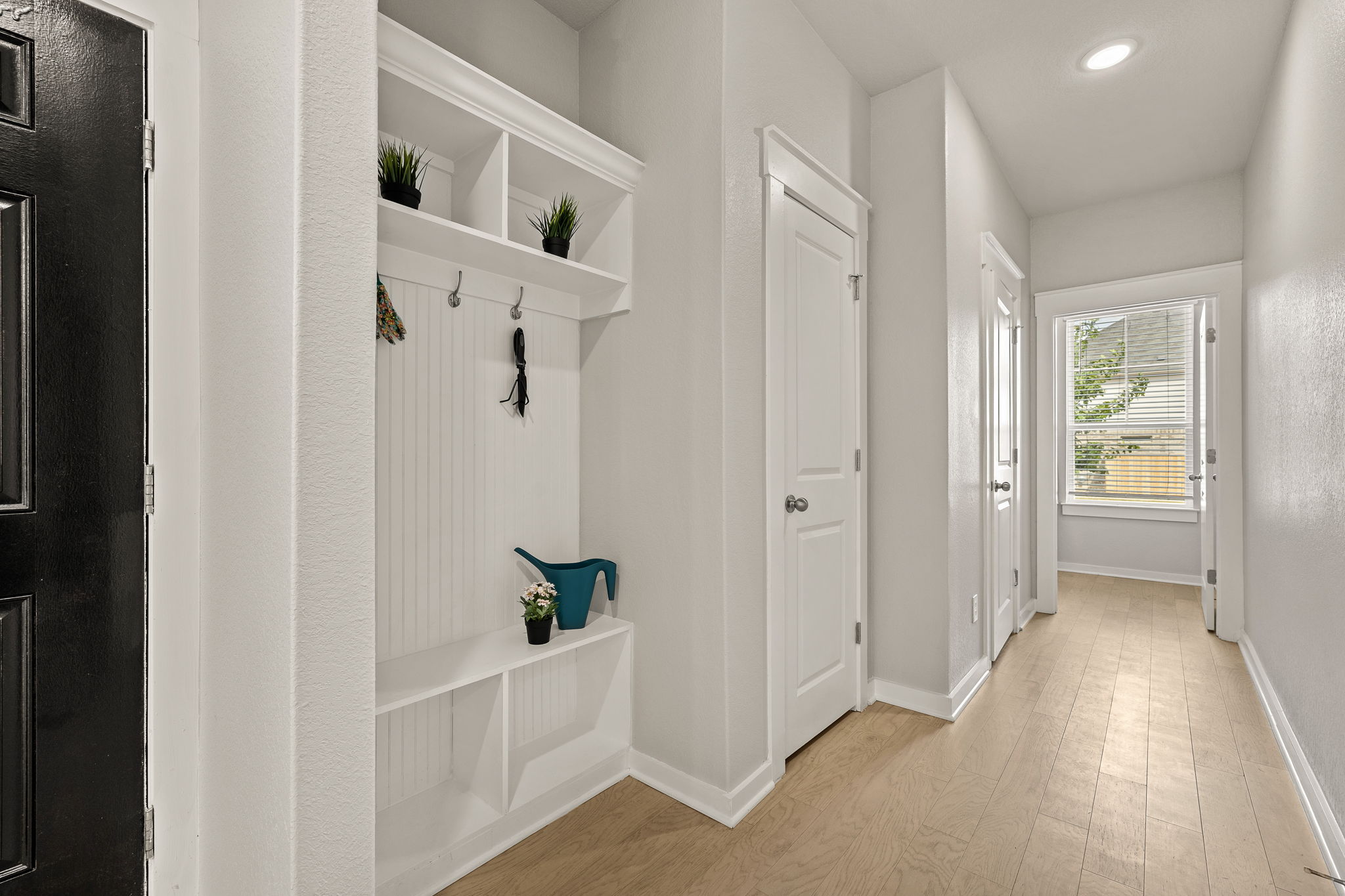 2233 Calvert Drive Leander, TX 78641 - Photo 2 of 32 A built-in mudroom is set off the entry for the perfect drop-zone.