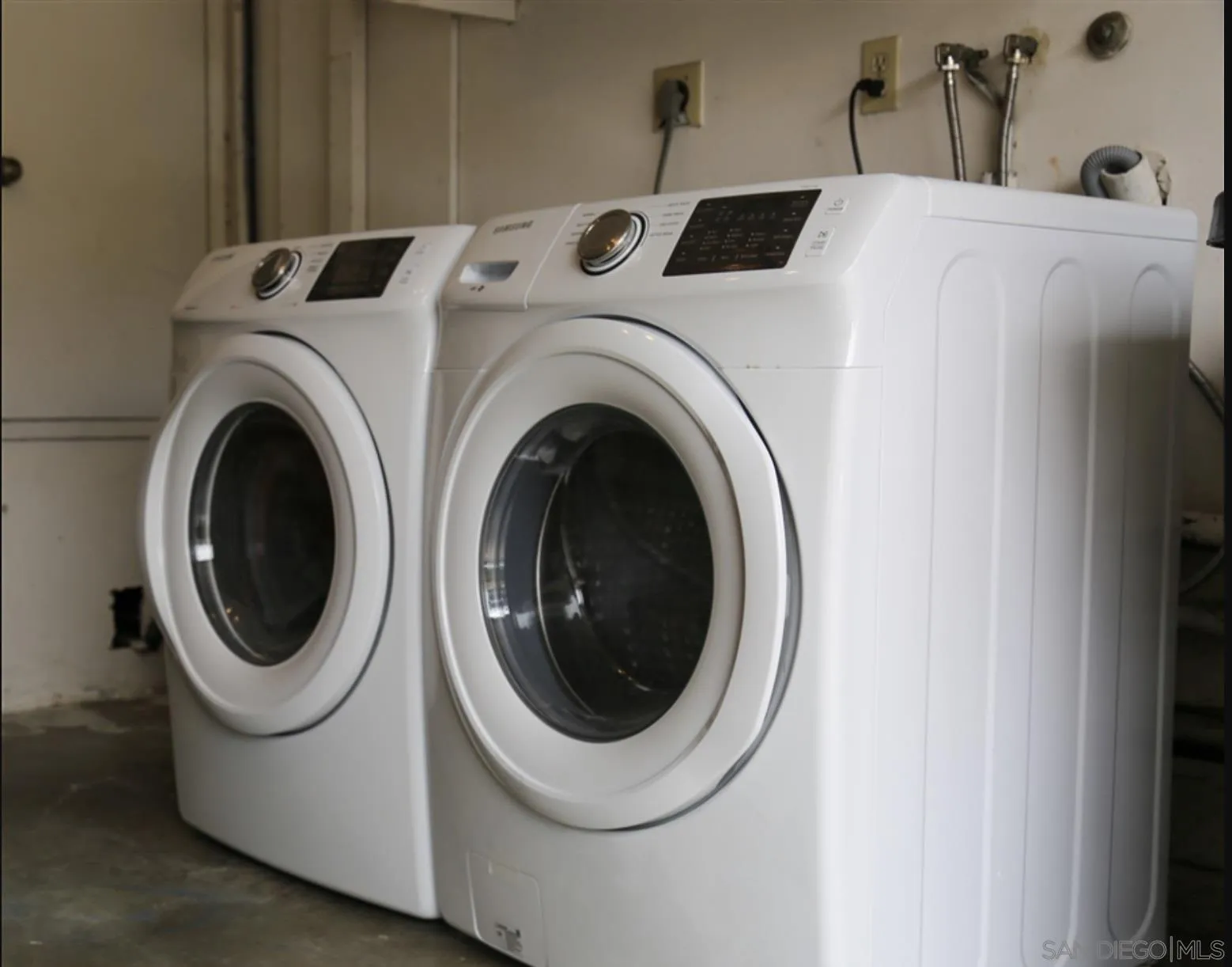 6555 Caminito Scioto La Jolla, CA 92037 - Photo 8 of 12 a utility room with dryer and washer