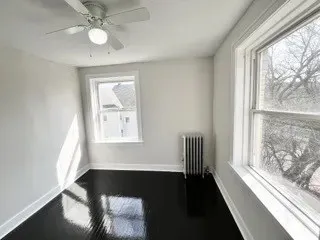 a view of a room that has a window in it