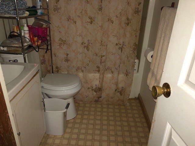 256 Broadway Taunton, MA 02780 - Photo 14 of 20 a bathroom with a sink and toilet