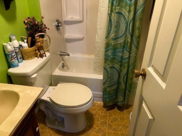 256 Broadway Taunton, MA 02780 - Photo 17 of 20 a bathroom with a toilet and a sink