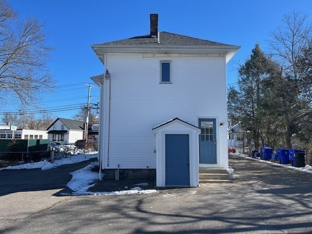 256 Broadway Taunton, MA 02780 - Photo 5 of 20 a front view of a house with a yard