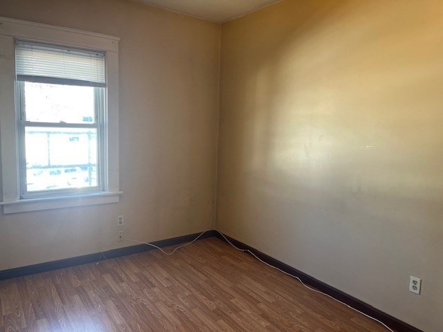 256 Broadway Taunton, MA 02780 - Photo 8 of 20 an empty room with a window