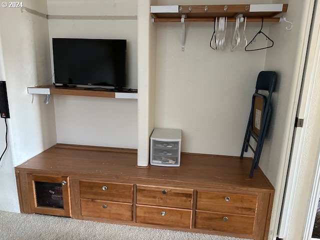 15061 Highway 101, Unit 4 Brookings, OR 97415 - Photo 9 of 12 a view of room with furniture and flat screen tv