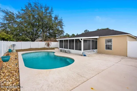 a view of outdoor space yard and swimming pool