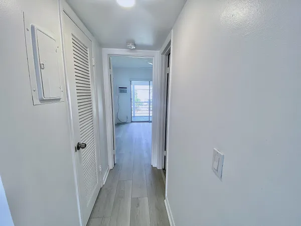 a view of a back yard from a balcony