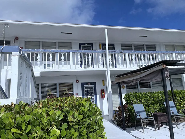 a room with furniture and pool table