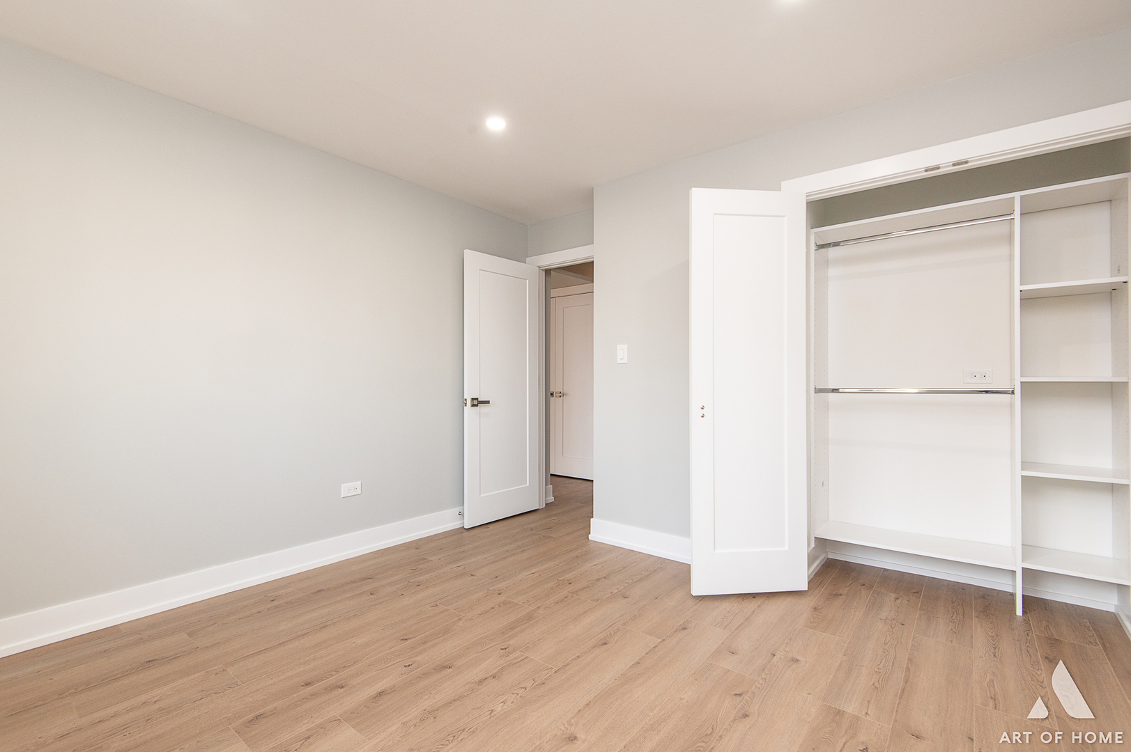 5159 North East River Road, Unit 312 Chicago, IL 60656 - Photo 24 of 42 a view of an empty room with wooden floor