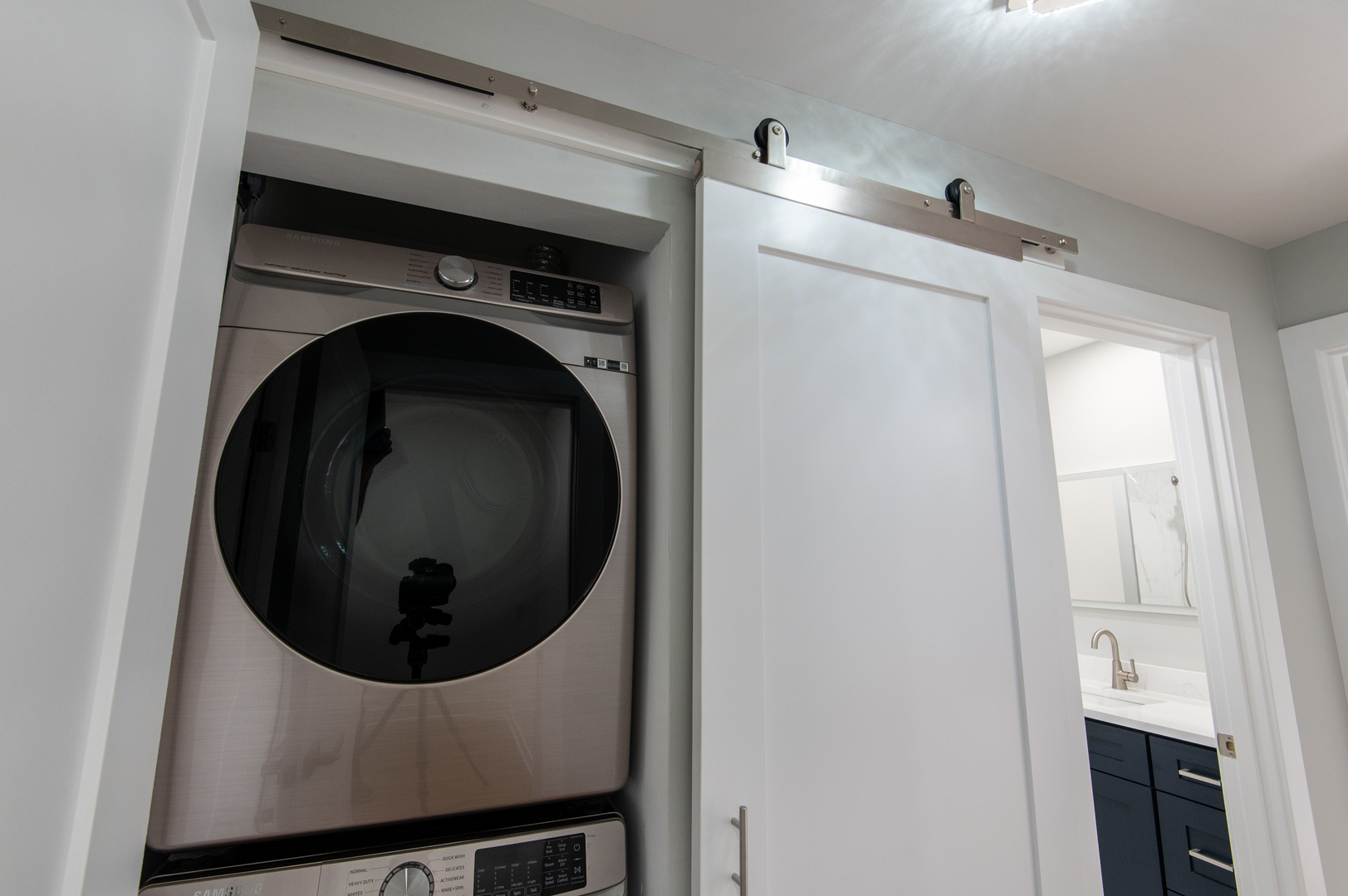 5159 North East River Road, Unit 312 Chicago, IL 60656 - Photo 33 of 42 a close view of a utility room with dryer and washer