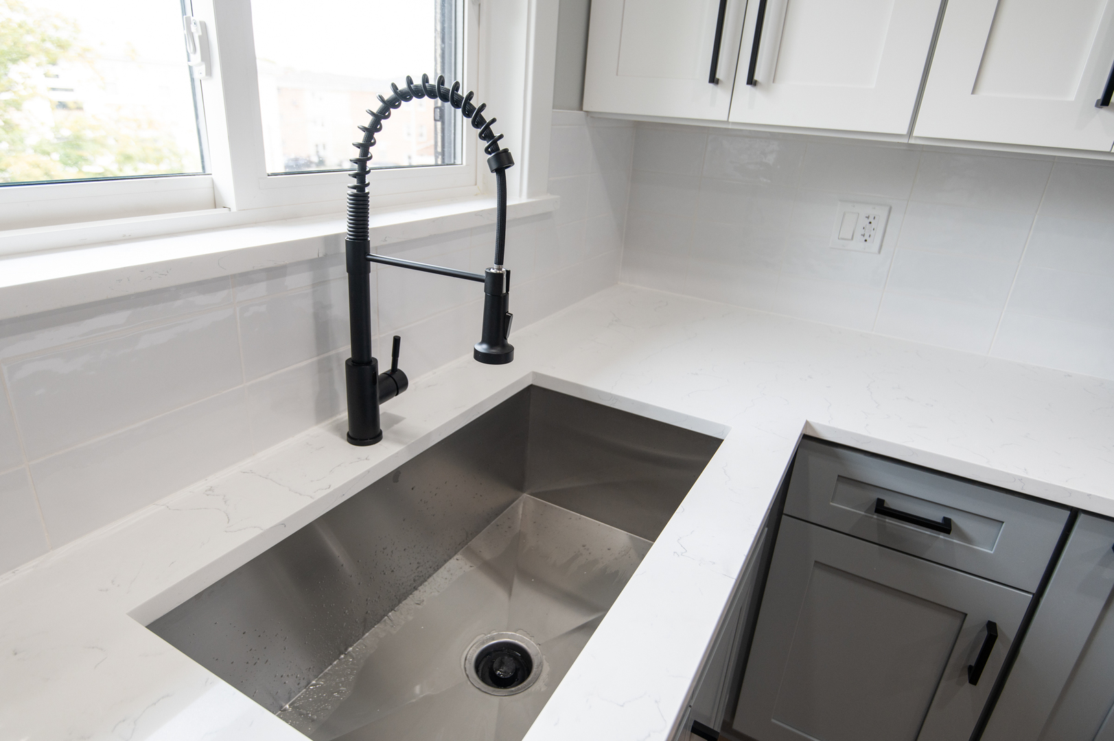 5159 North East River Road, Unit 312 Chicago, IL 60656 - Photo 7 of 42 a close view of sink and tap
